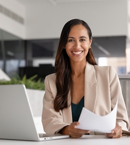 Portrait,Of,Happy,Female,Accountant,Or,Secretary,Sitting,At,Desk